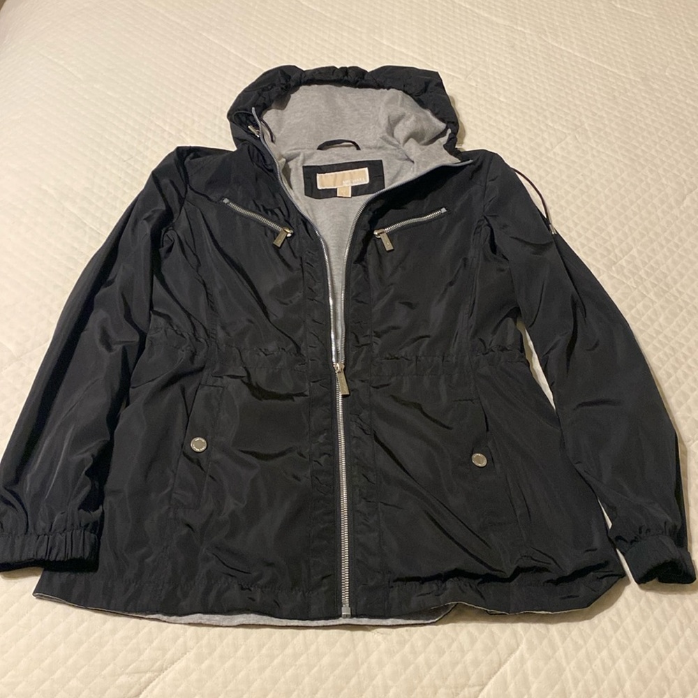 Michael Kors black hooded raincoat with carry bag
